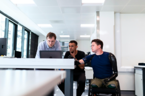 Man with a disability in an inclusive workplace.